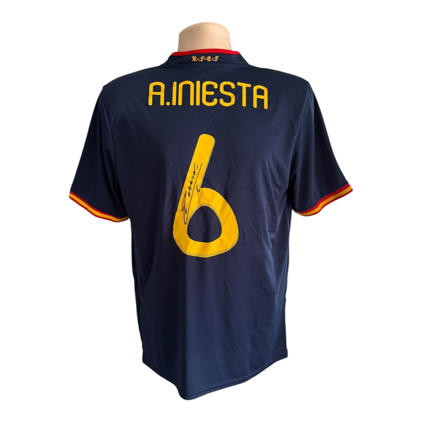 Andrés Iniesta hand signed WC 2010 final shirt